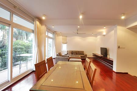 Bright and airy 2 bedrooms apartment for rent in Tay Ho St., with garden