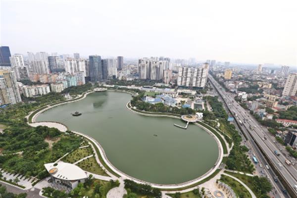 D’Capitale: Beautiful artificial lake view from the living room of 01 bedroom apartment.