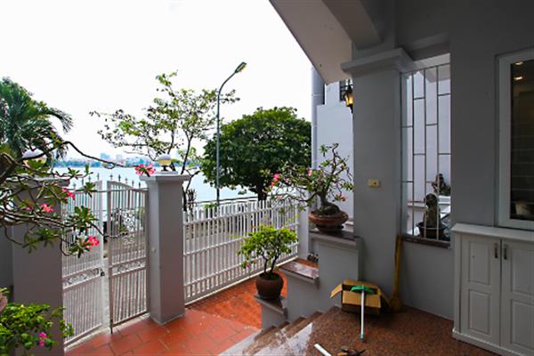 Lake view Charming house with front yard to rent in Dang Thai Mai. Big terace
