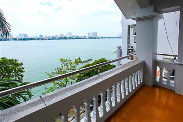 Lake view Charming house with front yard to rent in Dang Thai Mai. Big terace
