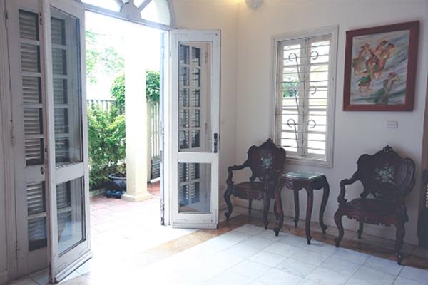 Lake view Villa with front yard to rent in Tay Ho, partial furniture