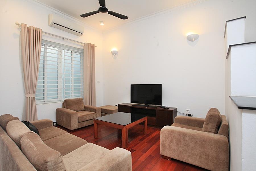 Charming 3 bedroom house with front yard on Xuan Dieu street, big balcony