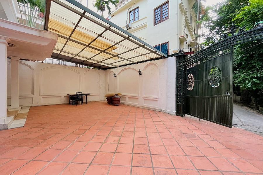 Large courtyard, partially-furnished 5 bedroom house in To Ngoc Van street, car access