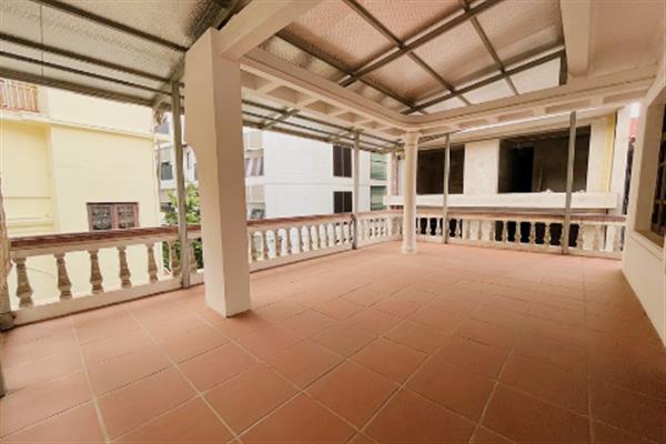 Large courtyard, partially-furnished 5 bedroom house in To Ngoc Van street, car access