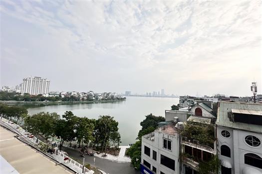 Huge balcony 2 bedroom apartment with overlooking the lake in front and back for rent in Tay Ho district.