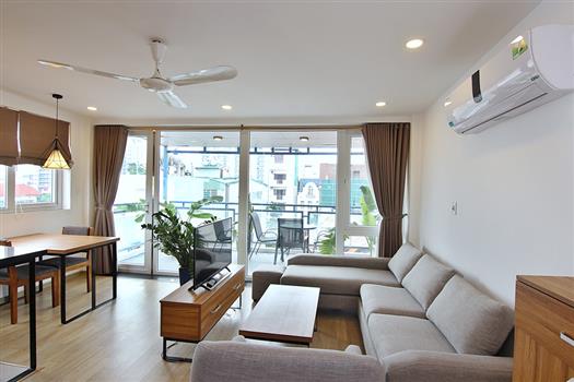 Sunlit 2 bedroom apartment with spacious balcony for rent on Dang Thai Mai