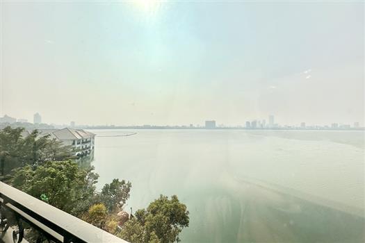 Bright & airy 3 bedroom apartment with lake view, balcony for rent in Xuan Dieu Str.